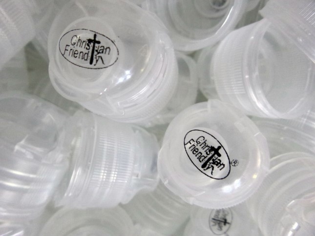 Our beautiful logo on clear sports/flip caps.