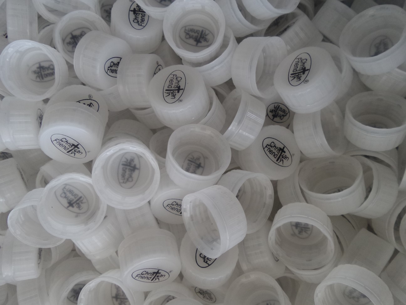 Our beautiful logo on white caps.